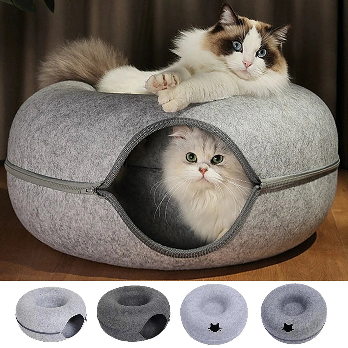 Chat couché sur le tunnel donut gris clair, un autre caché dedans
