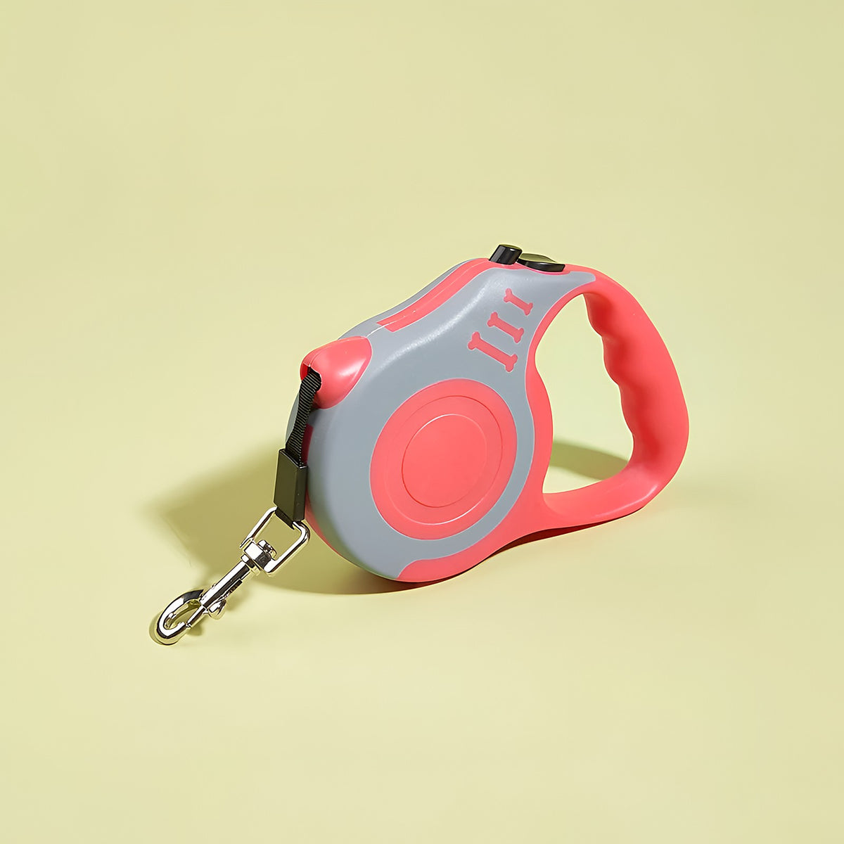 Laisse à enrouleur corail et grise
